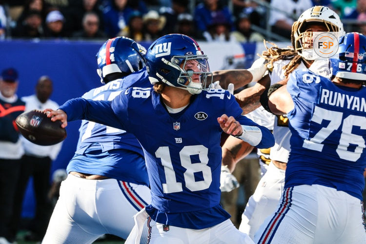 Oct 18, 2026; East Rutherford, New Jersey, USA; New York Giants quarterback J.J. McCarthy (18) throws a pass during the second half against the New Orleans Saints at MetLife Stadium. Credit: Vincent Carchietta-Imagn Images