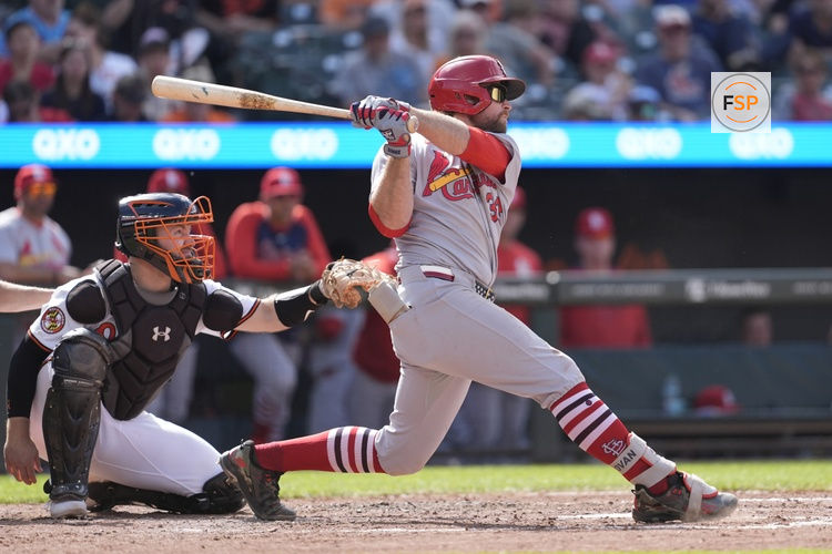 May 26, 2025; Baltimore, Maryland, USA; St. Louis Cardinals second baseman Brendan Donovan (33) hits a double against the Baltimore Orioles during the sixth inning at Oriole Park at Camden Yards. Credit: Gregory Fisher-Imagn Images