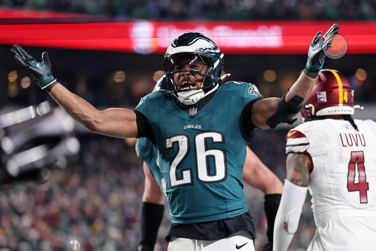 Jan 26, 2025; Philadelphia, PA, USA; Philadelphia Eagles running back Saquon Barkley (26) celebrates after a touchdown against the Washington Commanders during the second half in the NFC Championship game at Lincoln Financial Field. Credit: Bill Streicher-Imagn Images