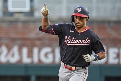 Jul 30, 2026; Cumberland, Georgia, USA; Washington Nationals left fielder Daylen Lile (4) reacts after hitting a home run against the Atlanta Braves during the second inning at Truist Park. Mandatory Credit: Dale Zanine-Imagn Images
