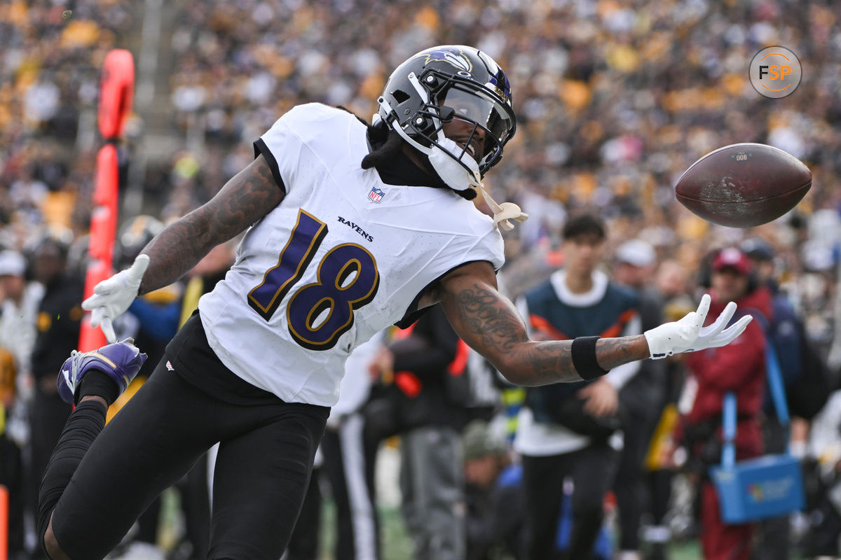 Nov 17, 2024; Pittsburgh, Pennsylvania, USA; Baltimore Ravens wide receiver Diontae Johnson (18) reaches for an incomplete pass against the Pittsburgh Steelers during the first quarter at Acrisure Stadium. Credit: Barry Reeger-Imagn Images