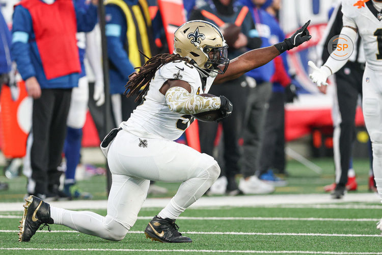 Dec 8, 2024; East Rutherford, New Jersey, USA; New Orleans Saints linebacker Demario Davis (56) celebrates his interception during the second half against the New York Giants at MetLife Stadium. Credit: Vincent Carchietta-Imagn Images