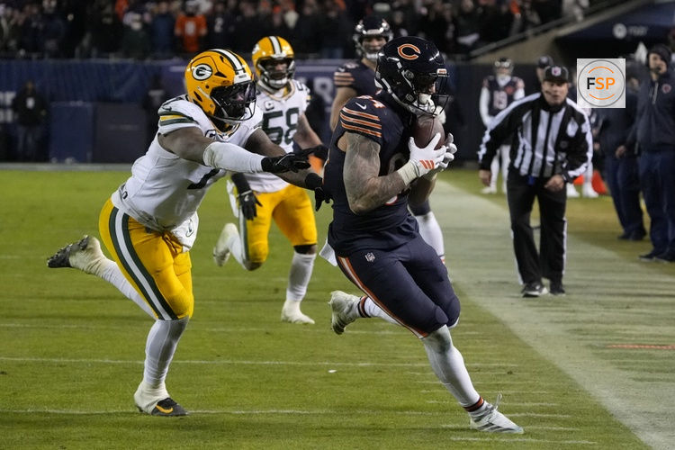 Jan 10, 2026; Chicago, IL, USA;  Chicago Bears tight end Colston Loveland (84) runs after the catch as Green Bay Packers linebacker Quay Walker (7) defends during the second half of an NFC Wild Card Round game at Soldier Field. Credit: David Banks-Imagn Images