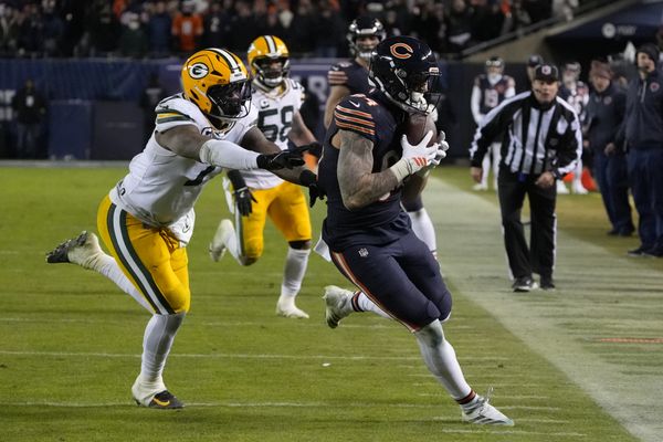 Jan 10, 2026; Chicago, IL, USA;  Chicago Bears tight end Colston Loveland (84) runs after the catch as Green Bay Packers linebacker Quay Walker (7) defends during the second half of an NFC Wild Card Round game at Soldier Field. Mandatory Credit: David Banks-Imagn Images