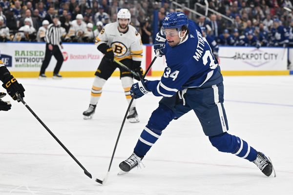 Nov 8, 2025; Toronto, Ontario, CAN;  Toronto Maple Leafs forward Auston Matthews (34) shoots the puck against the Boston Bruins in the third period at Scotiabank Arena. Mandatory Credit: Dan Hamilton-Imagn Images