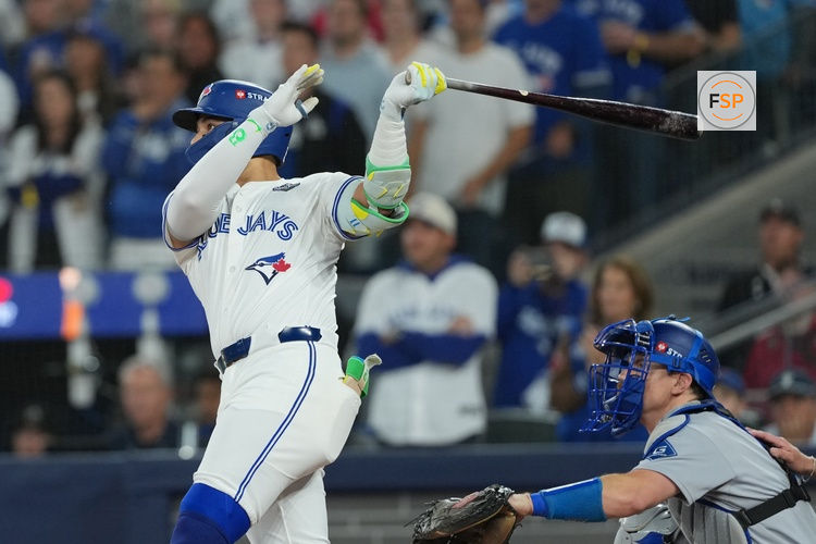 Nov 1, 2025; Toronto, Ontario, CAN; Toronto Blue Jays shortstop Bo Bichette (11) hits a three run home run against the Los Angeles Dodgers in the third inning for game seven of the 2025 MLB World Series at Rogers Centre. Credit: Nick Turchiaro-Imagn Images