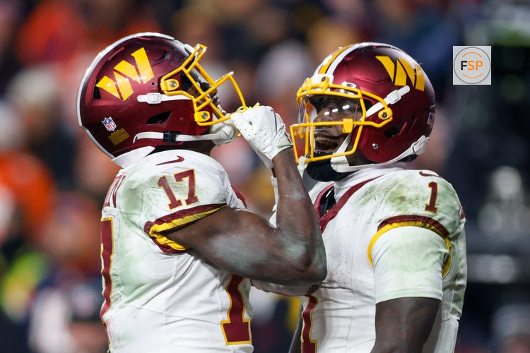 Nov 30, 2025; Landover, Maryland, USA; Washington Commanders wide receiver Terry McLaurin (17) celebrates after scoring a touchdown with Washington Commanders wide receiver Deebo Samuel (1) in overtime of the game at Northwest Stadium. Credit: Peter Casey-Imagn Images