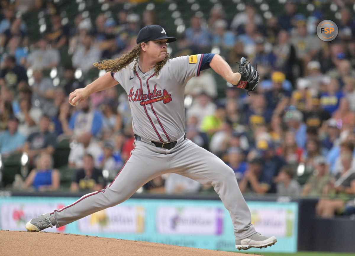 Jul 29, 2024; Milwaukee, Wisconsin, USA; Atlanta Braves starting pitcher Grant Holmes (66) delivers a pitch against the Milwaukee Brewers in the first inning at American Family Field. Mandatory Credit: Michael McLoone-USA TODAY Sports