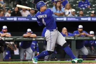 May 27, 2026; Baltimore, Maryland, USA; Toronto Blue Jays designated hitter George Springer (4) hits a double during the eighth inning against the Baltimore Orioles at Oriole Park at Camden Yards. Mandatory Credit: Daniel Kucin Jr.-Imagn Images