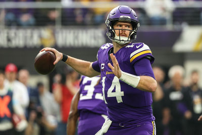 Dec 8, 2024; Minneapolis, Minnesota, USA; Minnesota Vikings quarterback Sam Darnold (14) throws the ball against the Atlanta Falcons during the first quarter at U.S. Bank Stadium. Mandatory Credit: Matt Krohn-Imagn Images