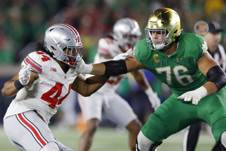 SOUTH BEND, IN - SEPTEMBER 23: Ohio State Buckeyes defensive end JT Tuimoloau (44) rushes against Notre Dame Fighting Irish offensive lineman Joe Alt (76) during a college football game on September 23, 2023 at Notre Dame Stadium in South Bend, Indiana. (Photo by Joe Robbins/Icon Sportswire)