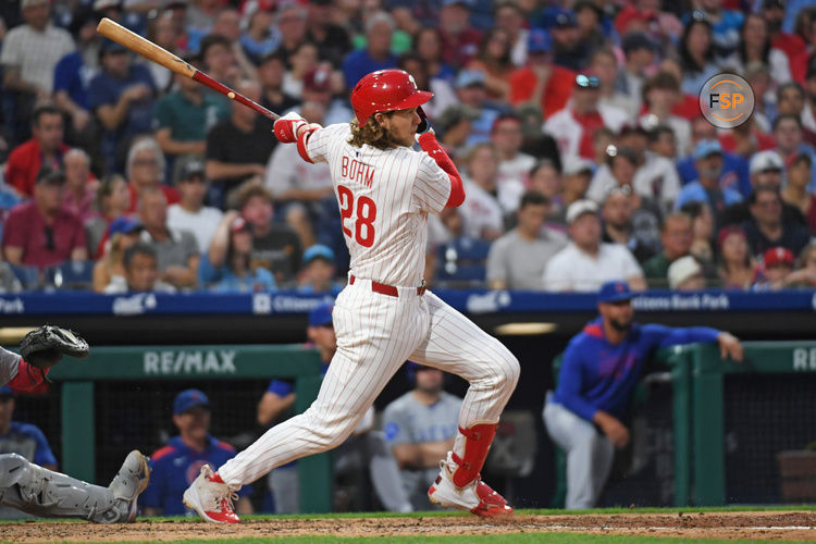 Jun 10, 2025; Philadelphia, Pennsylvania, USA; Philadelphia Phillies third base Alec Bohm (28) hits a two RBI double during the fifth inning against the Chicago Cubs at Citizens Bank Park. Credit: Eric Hartline-Imagn Images