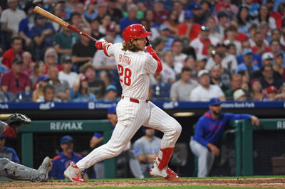 Jun 10, 2025; Philadelphia, Pennsylvania, USA; Philadelphia Phillies third base Alec Bohm (28) hits a two RBI double during the fifth inning against the Chicago Cubs at Citizens Bank Park. Mandatory Credit: Eric Hartline-Imagn Images
