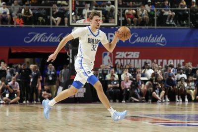 Jul 10, 2025; Las Vegas, NV, USA; Dallas Mavericks forward Cooper Flagg (32) dribbles the ball against the Los Angeles Lakers in the first quarter of their game at Thomas & Mack Center. Mandatory Credit: Candice Ward-Imagn Images