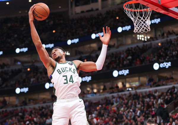 CHICAGO, IL - DECEMBER 28: Milwaukee Bucks Forward Giannis Antetokounmpo (34) grabs the rebound during a NBA game between the Milwaukee  Bucks and the Chicago Bulls on December 28, 2022 at the United Center in Chicago, IL. (Photo by Melissa Tamez/Icon Sportswire)