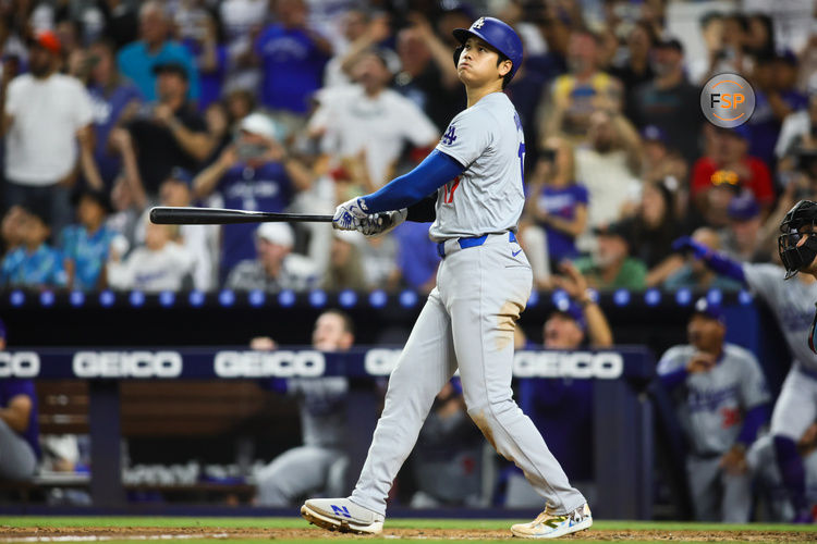 Sep 19, 2024; Miami, Florida, USA; Los Angeles Dodgers designated hitter Shohei Ohtani (17) hits a two-run home run against the Miami Marlins during the seventh inning at loanDepot Park. Credit: Sam Navarro-Imagn Images