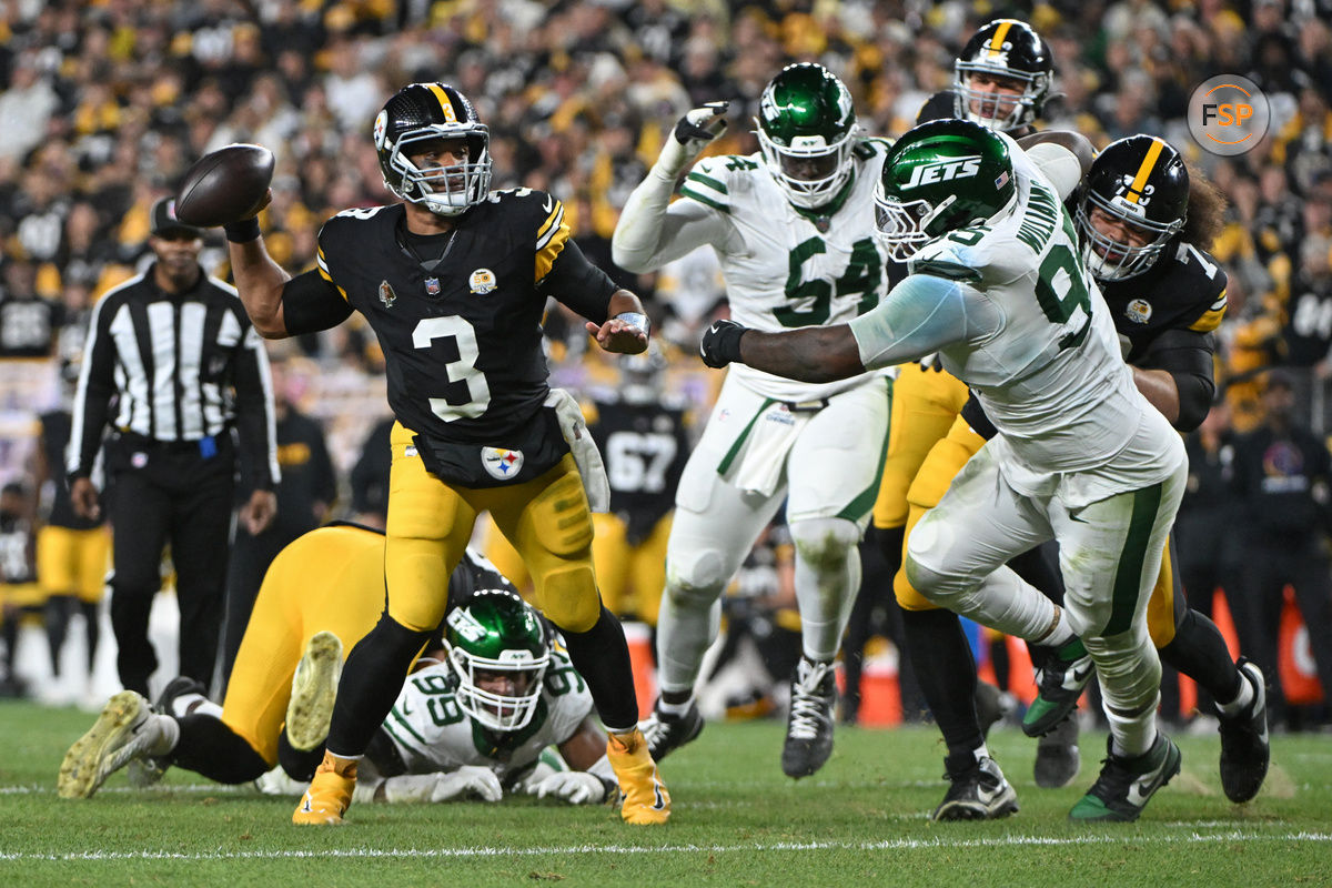 Oct 20, 2024; Pittsburgh, Pennsylvania, USA; Pittsburgh Steelers quarterback Russell Wilson (3) throws pass while being pressured by New York Jets defensive tackle Quinnen Williams (95) during the second quarter at Acrisure Stadium. Credit: Barry Reeger-Imagn Images