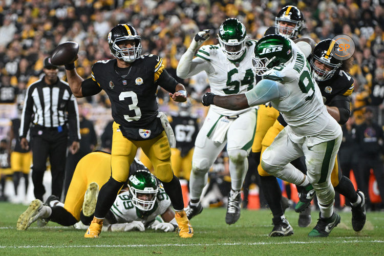 Oct 20, 2024; Pittsburgh, Pennsylvania, USA; Pittsburgh Steelers quarterback Russell Wilson (3) throws pass while being pressured by New York Jets defensive tackle Quinnen Williams (95) during the second quarter at Acrisure Stadium. Credit: Barry Reeger-Imagn Images