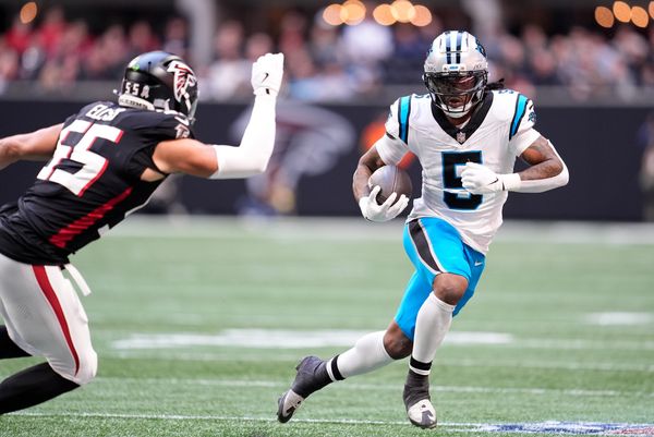 Nov 16, 2025; Atlanta, Georgia, USA;  Carolina Panthers running back Rico Dowdle (5) runs with the ball in the first quarter against the Atlanta Falcons at Mercedes-Benz Stadium. Mandatory Credit: Dale Zanine-Imagn Images
