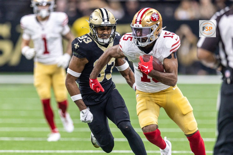 Sep 14, 2025; New Orleans, Louisiana, USA;  San Francisco 49ers wide receiver Jauan Jennings (15) runs after a catch against New Orleans Saints safety Jonas Sanker (33) during the first half at Caesars Superdome. Credit: Stephen Lew-Imagn Images