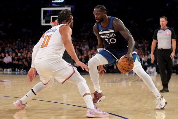 Nov 5, 2025; New York, New York, USA; Minnesota Timberwolves forward Julius Randle (30) controls the ball against New York Knicks guard Jalen Brunson (11) during the first quarter at Madison Square Garden. Mandatory Credit: Brad Penner-Imagn Images