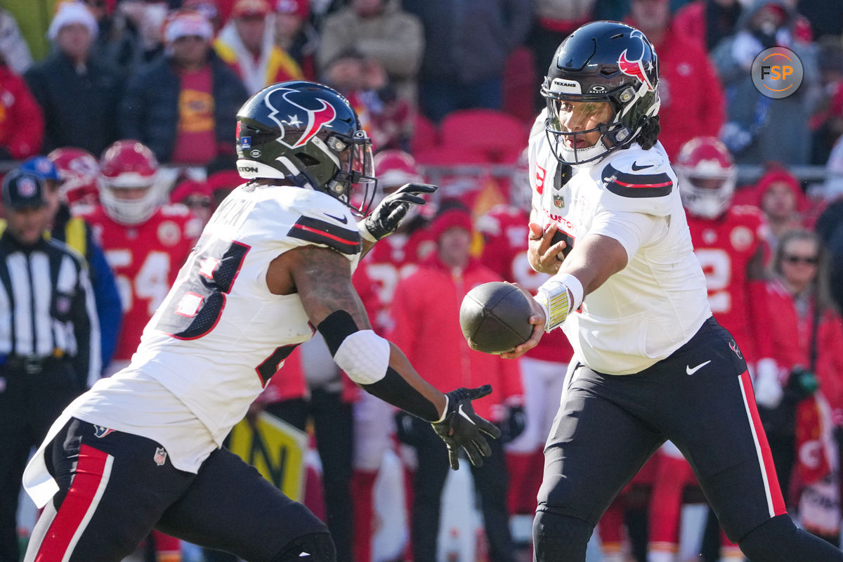 Dec 21, 2024; Kansas City, Missouri, USA; Houston Texans quarterback C.J. Stroud (7) hands off to running back Joe Mixon (28) against the Kansas City Chiefs during the first half at GEHA Field at Arrowhead Stadium. Credit: Denny Medley-Imagn Images