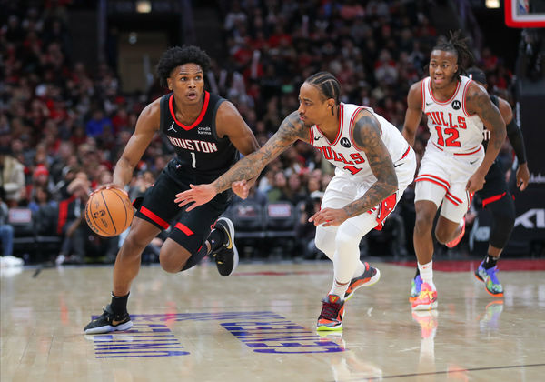 CHICAGO, IL - JANUARY 10: DeMar DeRozan #11 of the Chicago Bulls guards Amen Thompson #1 of the Houston Rockets during the second half at the United Center on January 10, 2024 in Chicago, Illinois. (Photo by Melissa Tamez/Icon Sportswire)