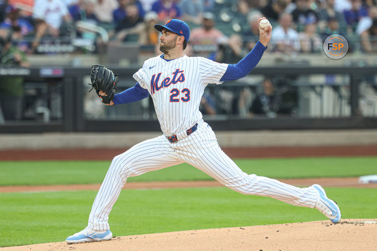 Jun 11, 2025; New York City, New York, USA; New York Mets starting pitcher David Peterson (23) delivers a pitch during the first inning against the Washington Nationals at Citi Field. Credit: Vincent Carchietta-Imagn Images