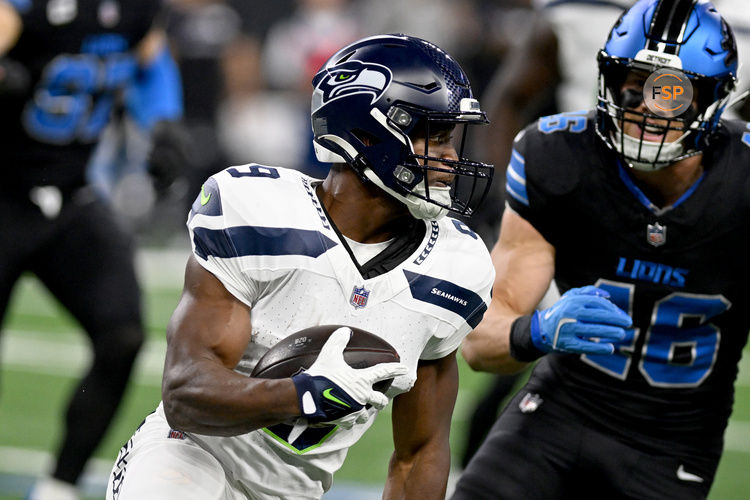 Sep 30, 2024; Detroit, Michigan, USA; Seattle Seahawks running back Kenneth Walker III (9) runs the ball against the Detroit Lions in the first quarter at Ford Field. Credit: Lon Horwedel-Imagn Images