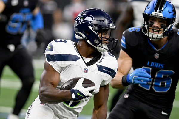 Sep 30, 2024; Detroit, Michigan, USA; Seattle Seahawks running back Kenneth Walker III (9) runs the ball against the Detroit Lions in the first quarter at Ford Field. Mandatory Credit: Lon Horwedel-Imagn Images