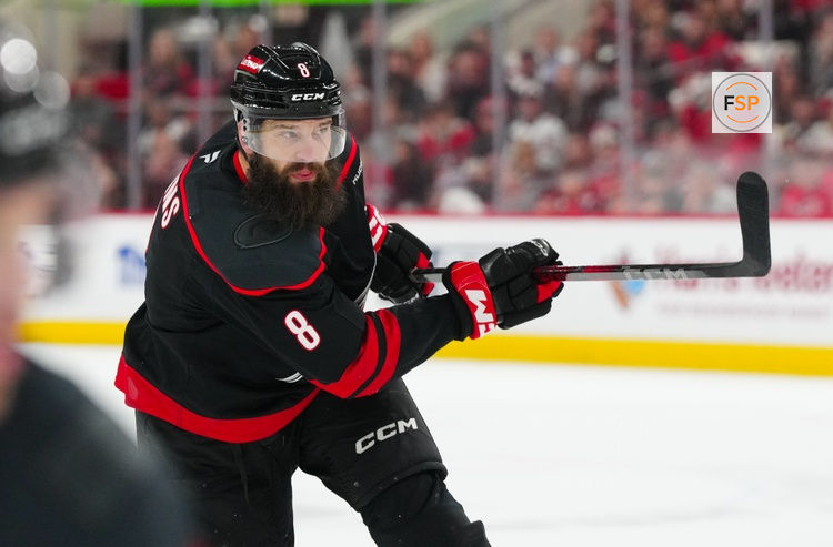 May 10, 2025; Raleigh, North Carolina, USA; Carolina Hurricanes defenseman Brent Burns (8) takes a shot against the Washington Capitals during the third period in game three of the second round of the 2025 Stanley Cup Playoffs at Lenovo Center. Credit: James Guillory-Imagn Images