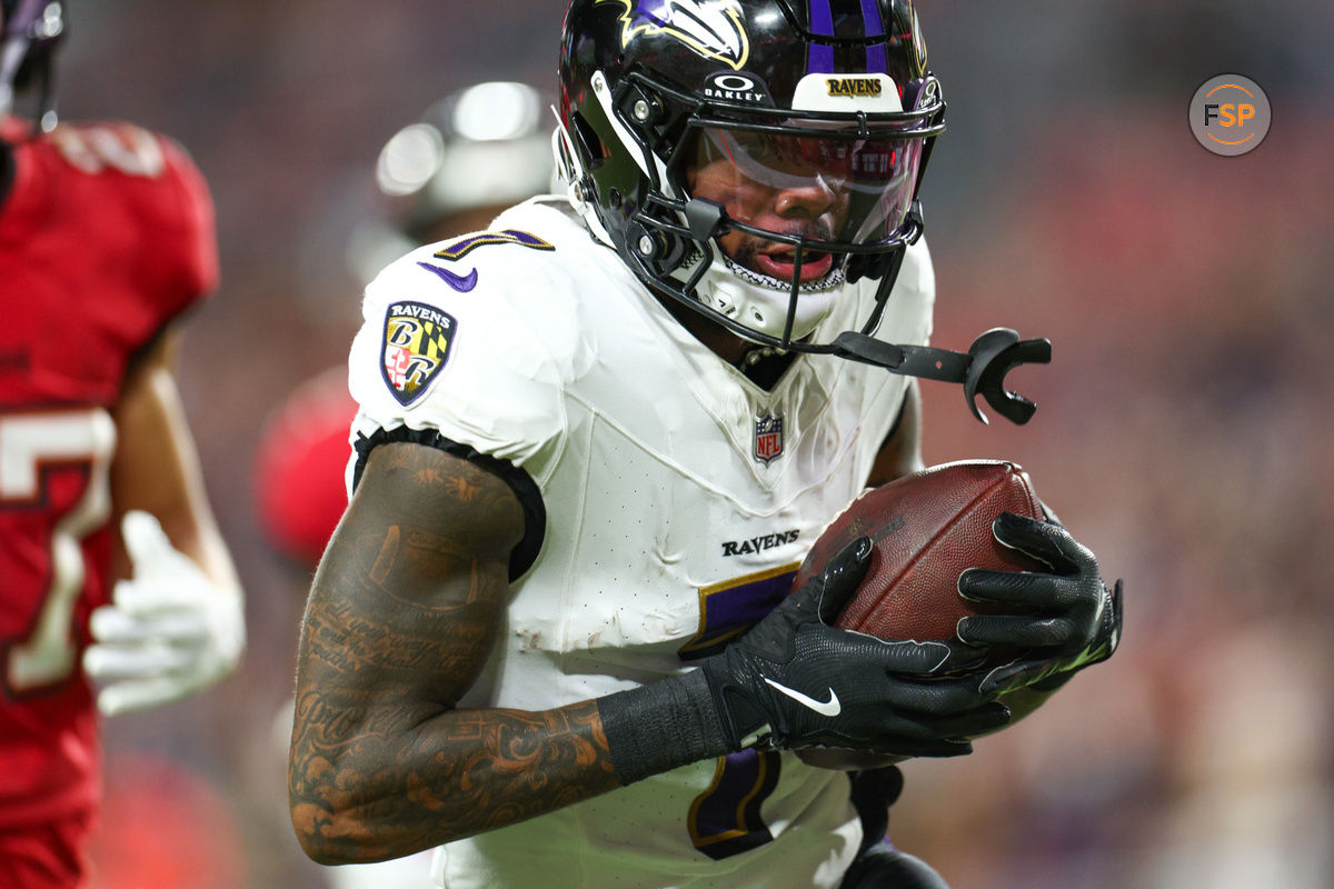 Oct 21, 2024; Tampa, Florida, USA; Baltimore Ravens wide receiver Rashod Bateman (7) scores a touchdown against the Tampa Bay Buccaneers in the third quarter at Raymond James Stadium. Credit: Nathan Ray Seebeck-Imagn Images