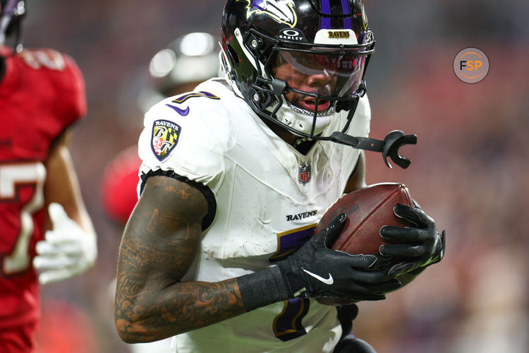 Oct 21, 2024; Tampa, Florida, USA; Baltimore Ravens wide receiver Rashod Bateman (7) scores a touchdown against the Tampa Bay Buccaneers in the third quarter at Raymond James Stadium. Credit: Nathan Ray Seebeck-Imagn Images