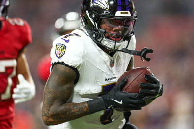 Oct 21, 2024; Tampa, Florida, USA; Baltimore Ravens wide receiver Rashod Bateman (7) scores a touchdown against the Tampa Bay Buccaneers in the third quarter at Raymond James Stadium. Mandatory Credit: Nathan Ray Seebeck-Imagn Images