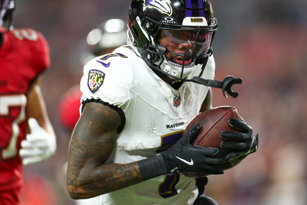 Oct 21, 2024; Tampa, Florida, USA; Baltimore Ravens wide receiver Rashod Bateman (7) scores a touchdown against the Tampa Bay Buccaneers in the third quarter at Raymond James Stadium. Mandatory Credit: Nathan Ray Seebeck-Imagn Images