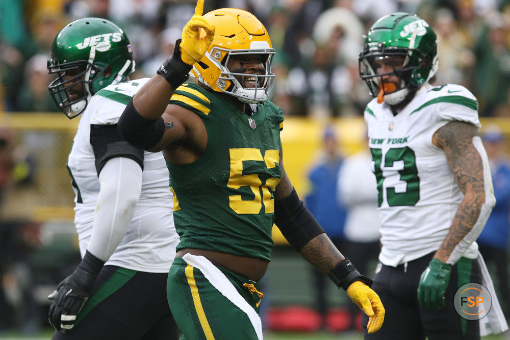 GREEN BAY, WI - OCTOBER 16: Green Bay Packers linebacker Rashan Gary (52) celebrates a sack during a game between the Green Bay Packers and the New York Jets at Lambeau Field on October 16, 2022 in Green Bay, WI. (Photo by Larry Radloff/Icon Sportswire)