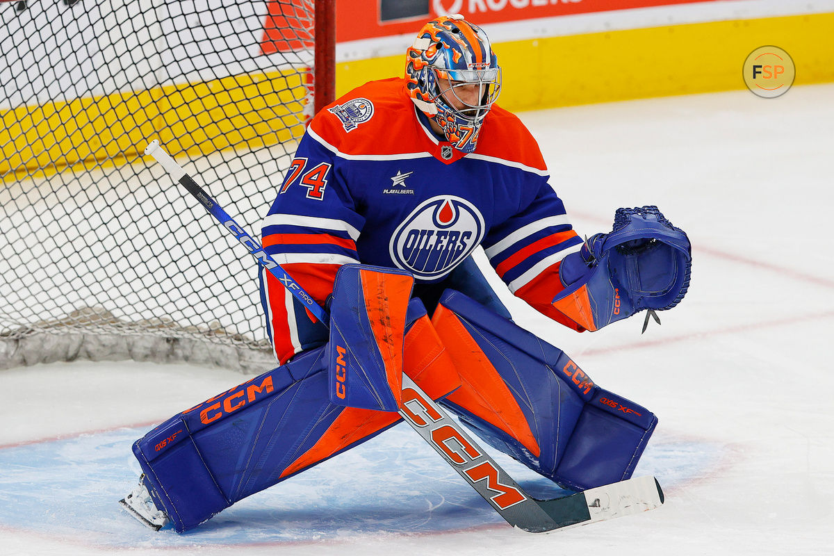 Oct 25, 2024; Edmonton, Alberta, CAN; Edmonton Oilers goaltender Stuart Skinner (74) makes a save during warmup against the Pittsburgh Penguins at Rogers Place. Credit: Perry Nelson-Imagn Images