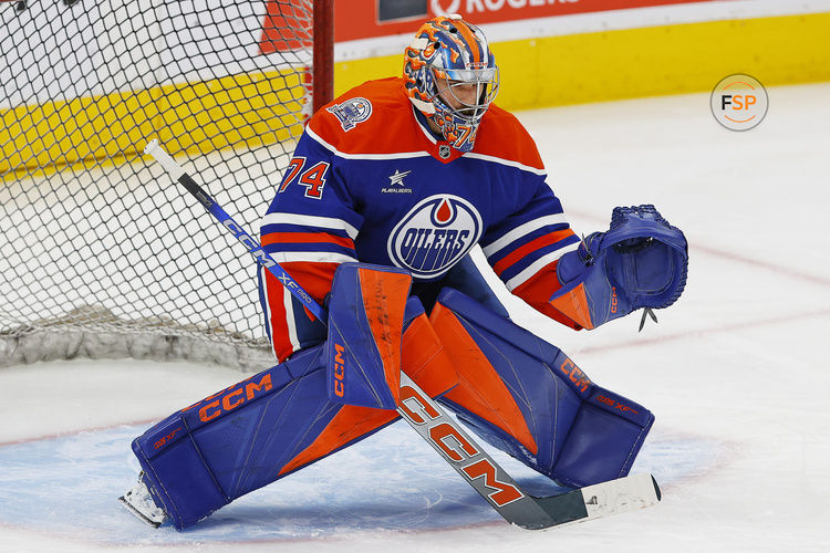 Oct 25, 2024; Edmonton, Alberta, CAN; Edmonton Oilers goaltender Stuart Skinner (74) makes a save during warmup against the Pittsburgh Penguins at Rogers Place. Credit: Perry Nelson-Imagn Images