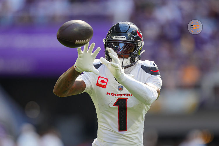 Sep 22, 2024; Minneapolis, Minnesota, USA; Houston Texans wide receiver Stefon Diggs (1) warms up before the game against the Minnesota Vikings at U.S. Bank Stadium. Credit: Brad Rempel-Imagn Images