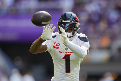 Sep 22, 2024; Minneapolis, Minnesota, USA; Houston Texans wide receiver Stefon Diggs (1) warms up before the game against the Minnesota Vikings at U.S. Bank Stadium. Mandatory Credit: Brad Rempel-Imagn Images