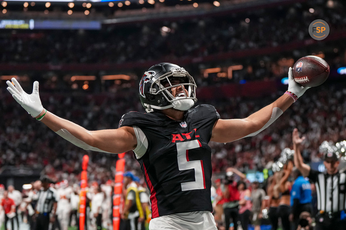 Sep 22, 2024; Atlanta, Georgia, USA; Atlanta Falcons wide receiver Drake London (5) reacts after catching a touchdown pass against the Kansas City Chiefs during the first quarter at Mercedes-Benz Stadium. Credit: Dale Zanine-Imagn Images