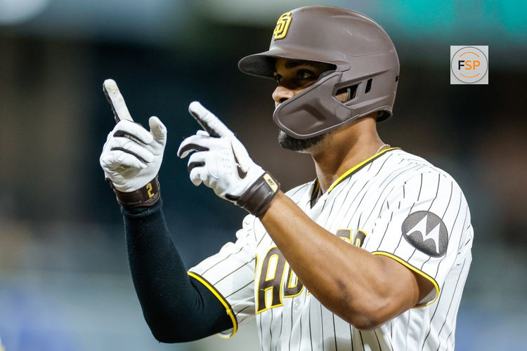 Apr 14, 2026; San Diego, California, USA; San Diego Padres shortstop Xander Bogaerts (2) celebrates after hitting a two-RBI single during the third inning against the Seattle Mariners at Petco Park. Credit: David Frerker-Imagn Images