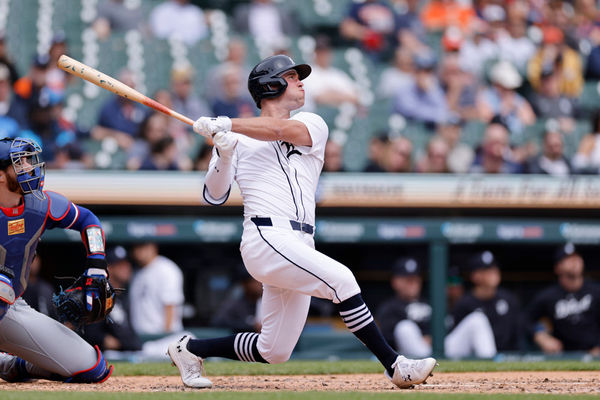 DETROIT, MI - APRIL 18: Detroit Tigers designated hitter Kerry Carpenter (30) hits a triple to center field to drive in two runs during an MLB game against the Texas Rangers on April 18, 2024 at Comerica Park in Detroit, Michigan. (Photo by Joe Robbins/Icon Sportswire)
