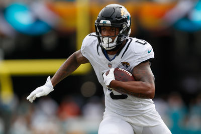 Sep 15, 2024; Jacksonville, Florida, USA; Jacksonville Jaguars wide receiver Gabe Davis (0) runs the ball against the Cleveland Browns during the fourth quarter at EverBank Stadium. Mandatory Credit: Morgan Tencza-Imagn Images