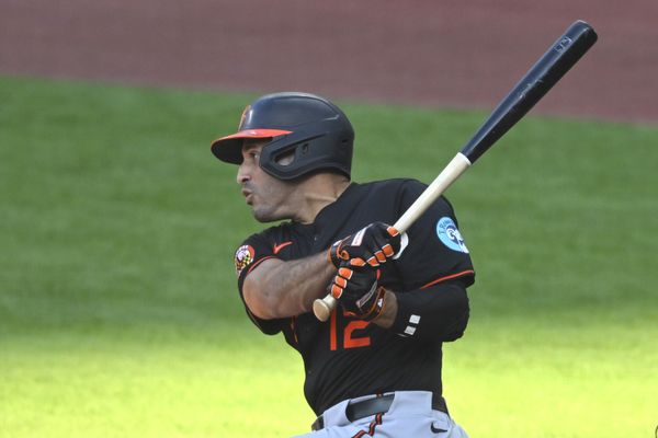Jul 21, 2025; Cleveland, Ohio, USA; Baltimore Orioles left fielder Ramon Laureano (12) hits a two-RBI single in the first inning against the Cleveland Guardians at Progressive Field. Mandatory Credit: David Richard-Imagn Images