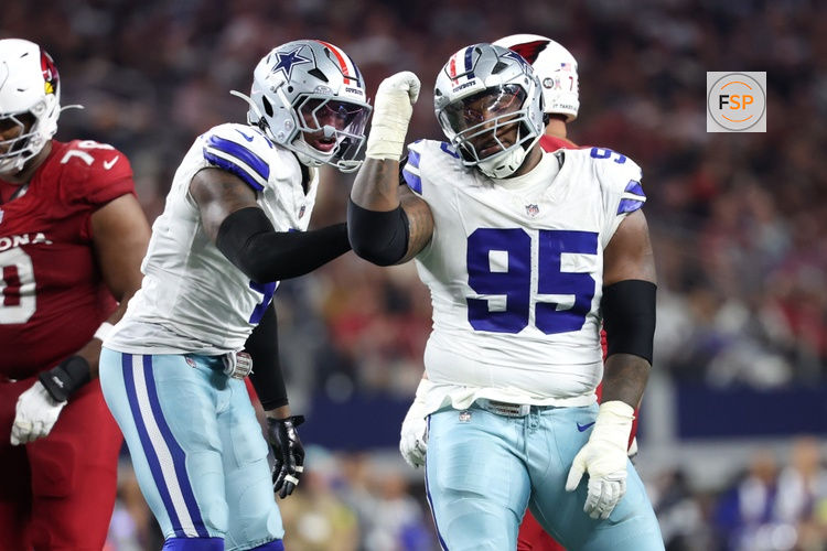 Nov 3, 2025; Arlington, Texas, USA; Dallas Cowboys defensive tackle Kenny Clark (95) and defensive end Donovan Ezeiruaku (41) celebrate after a sack Arizona Cardinals quarterback Jacoby Brissett (7) in the second half at AT&T Stadium. Credit: Kevin Jairaj-Imagn Images