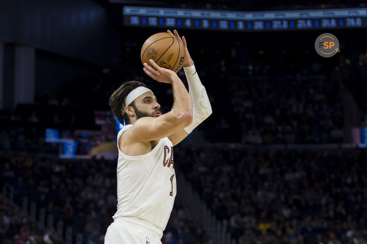 Dec 30, 2024; San Francisco, California, USA; Cleveland Cavaliers guard Max Strus (1) takes a three-point shot against the Golden State Warriors during the fourth quarter at Chase Center. Credit: John Hefti-Imagn Images