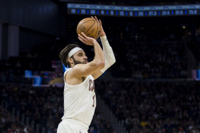 Dec 30, 2024; San Francisco, California, USA; Cleveland Cavaliers guard Max Strus (1) takes a three-point shot against the Golden State Warriors during the fourth quarter at Chase Center. Mandatory Credit: John Hefti-Imagn Images