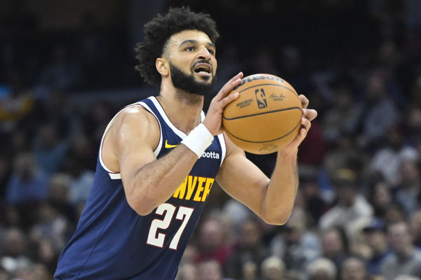 Dec 5, 2024; Cleveland, Ohio, USA; Denver Nuggets guard Jamal Murray (27) looks to shoot in the second quarter against the Cleveland Cavaliers at Rocket Mortgage FieldHouse. Mandatory Credit: David Richard-Imagn Images