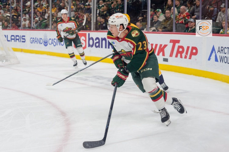 Nov 4, 2025; Saint Paul, Minnesota, USA; Minnesota Wild center Marco Rossi (23) carries the puck out of the defensive zone against the Nashville Predators in the third period at Grand Casino Arena. Credit: Matt Blewett-Imagn Images